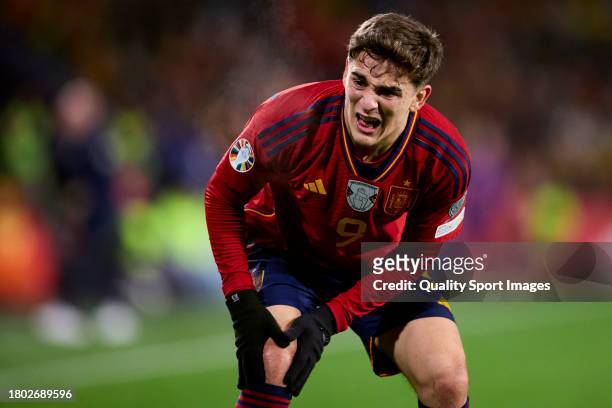 Pablo Gavi of Spain reacts after injury during the UEFA EURO 2024 European qualifier match between Spain and Georgia at Jose Zorrilla on November 19,...
