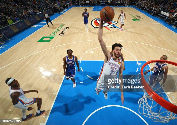 Chet Holmgren of the Oklahoma City Thunder drives to the basket during the game against the Philadelphia 76ers on November 25, 2023 at Paycom Arena...