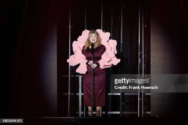American singer Maite Kelly performs live on stage during a concert at the Mercedes-Benz Arena on November 25, 2023 in Berlin, Germany.
