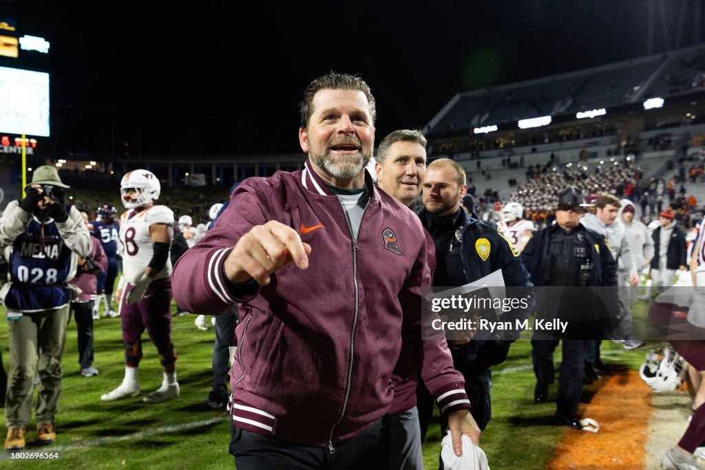 Head coach Brent Pry of the Virginia Tech Hokies celebrates defeating ...