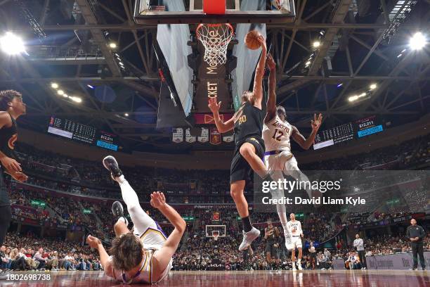 Georges Niang of the Cleveland Cavaliers drives to the basket during the game against the Los Angeles Lakers on November 25, 2023 at Rocket Mortgage...