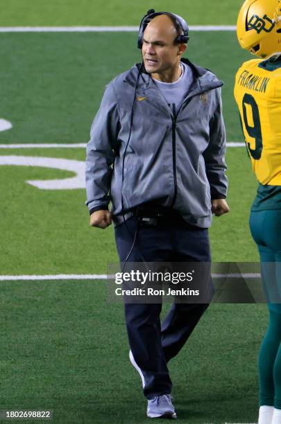 Head coach Dave Aranda of the Baylor Bears calls a play during the game against the West Virginia Mountaineers in the first half at McLane Stadium on...