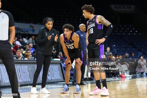 Head Coach Lindsey Harding of the Stockton Kings, Colby Jones, and Jalen Slawson of the Stockton Kings talk during a timeout against the Ontario...
