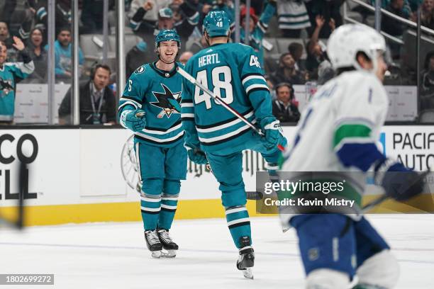 Ty Emberson of the San Jose Sharks celebrates scoring his first NHL goal against the Vancouver Canucks at SAP Center on November 25, 2023 in San...
