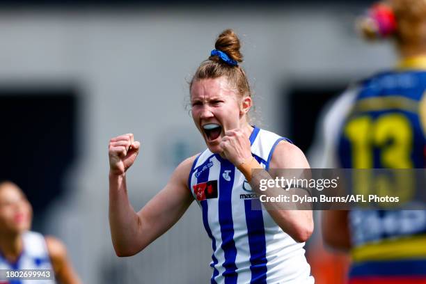 Tahlia Randall of the Kangaroos celebrates a goal during the 2023 AFLW Second Preliminary Final match between The North Melbourne Tasmanian Kangaroos...