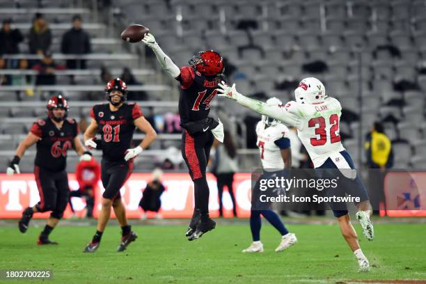 San Diego State wide receiver Phillippe Wesley II narrowly misses a catch during a college football game between the Fresno State Bulldogs and the...