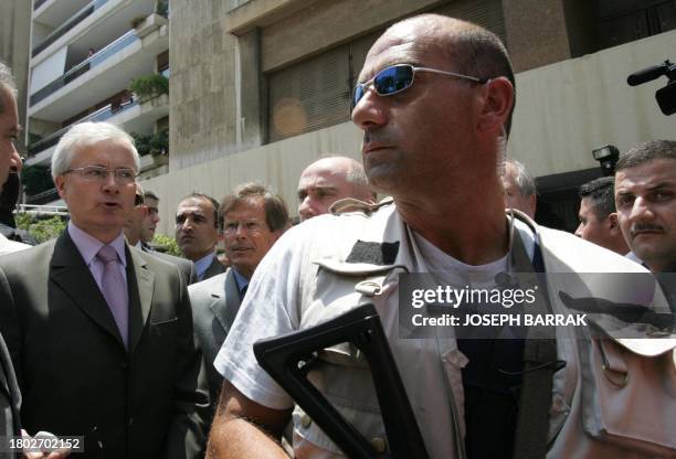 French Ambassador to Lebanon Bernard Emie visits 02 June 2005 the site of the car bomb explosion that killed prominent anti-Syrian journalist Samir...