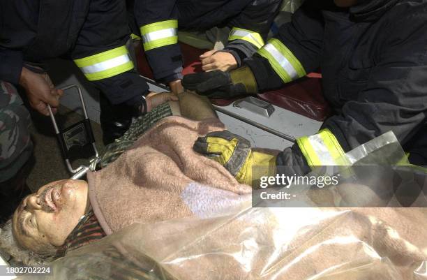 The body of former Lebanese Communist party chief George Hawi is removed by Lebanese army officers from his exploded car in Beirut, Lebanon 21 June...