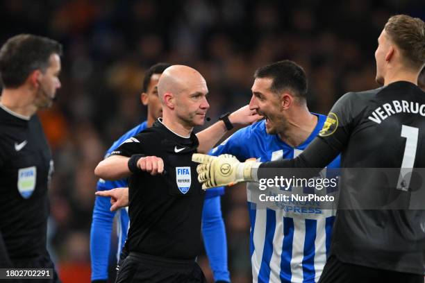 Lewis Dunk of Brighton is shouting at referee Anthony Taylor after he awarded a penalty to Nottingham Forest during the Premier League match between...