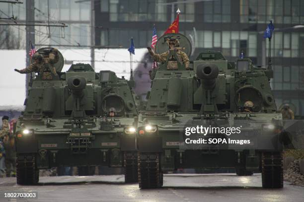 Army self-propelled howitzers M109 Paladin take part in a military parade during Armed Forces Day in Vilnius. Armed Forces Day honours the...