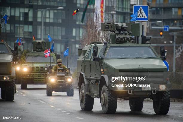 Belgian army heavily armored infantry mobility vehicles ATF Dingo take part in a military parade during Armed Forces Day in Vilnius. Armed Forces Day...