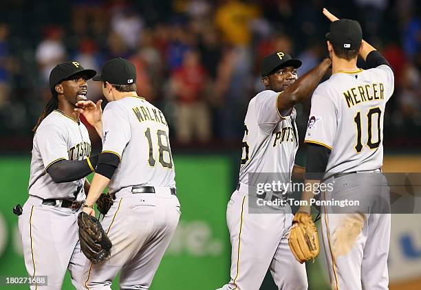 Pittsburgh Pirates center fielder Andrew McCutchen and Pittsburgh Pirates left fielder Felix Pie celebrate with Pittsburgh Pirates second baseman...