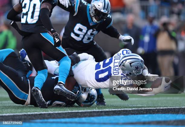 Tony Pollard of the Dallas Cowboys dives for a touchdown during the fourth quarter in the game against the Carolina Panthers at Bank of America...