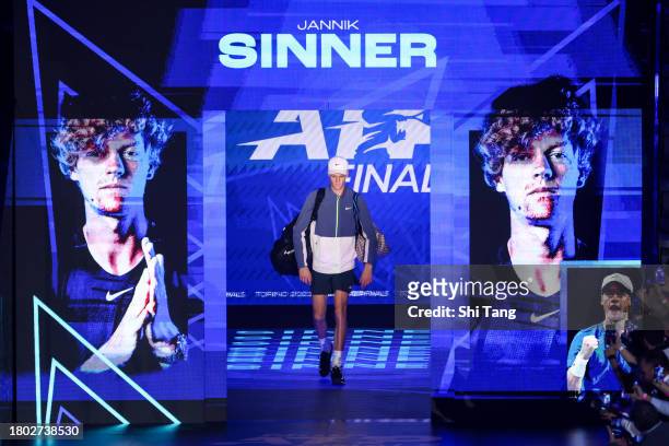 Jannik Sinner of Italy walks to the court before his Men's Singles Final match against Novak Djokovic of Serbia during day eight of the Nitto ATP...