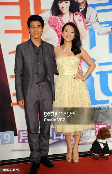 Actress Zhang Ziyi and actor Leehom Wang attend "My Lucky Star" premiere at Saga Cinema on September 10, 2013 in Beijing, China.