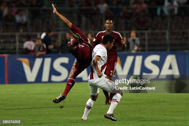 Paolo Hurtado of Peru in action during a match between Venezuela and Peru as part of the 16th round of the South American Qualifiers at Olimpico...