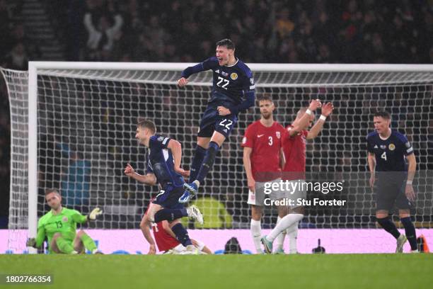 Nathan Patterson of Scotland celebrates after the teams third goal scored by teammate Stuart Armstrong during the UEFA EURO 2024 European qualifier...