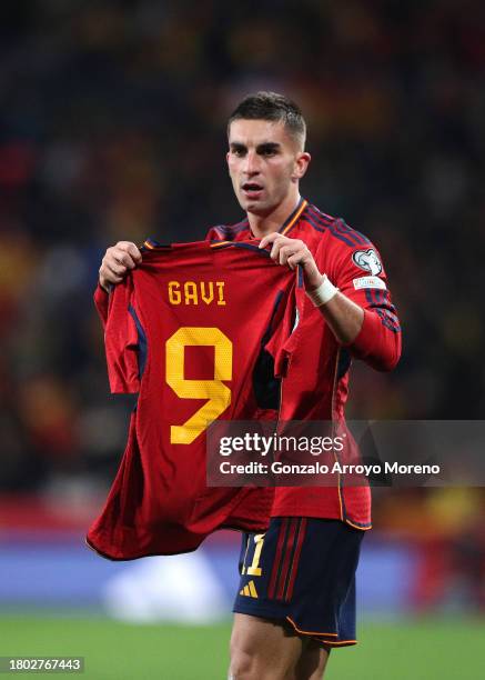 Ferran Torres of Spain celebrates by holding the shirt of teammate Gavi after scoring the team's second goal during the UEFA EURO 2024 European...