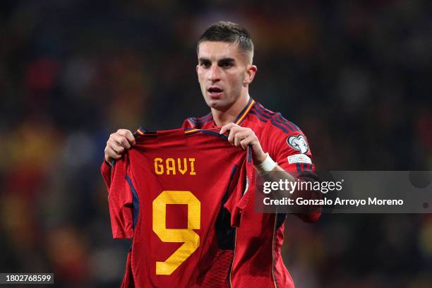 Ferran Torres of Spain celebrates by holding the shirt of teammate Gavi after scoring the team's second goal during the UEFA EURO 2024 European...