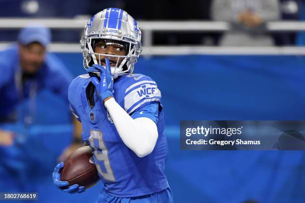 Jameson Williams of the Detroit Lions scores a fourth quarter touchdown against the Chicago Bears at Ford Field on November 19, 2023 in Detroit,...