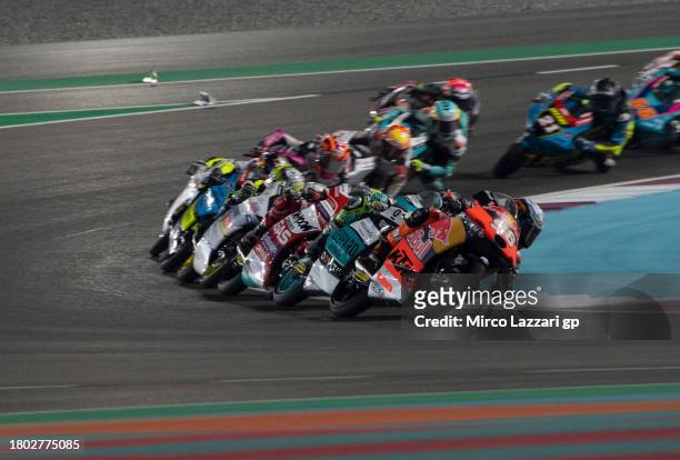 Daniel Holgado of Spain and Red Bull KTM Tech3 leads the field during the Moto3 race during the MotoGP of Qatar - Race at Losail Circuit on November...