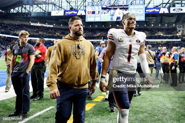 Justin Fields of the Chicago Bears walks off the field after a game against the Detroit Lions at Ford Field on November 19, 2023 in Detroit, Michigan.