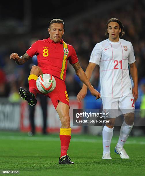 Wales player Craig Bellamy in action during the FIFA 2014 World Cup Qualifier Group A match between Wales and Serbia at Cardiff City Stadium on...