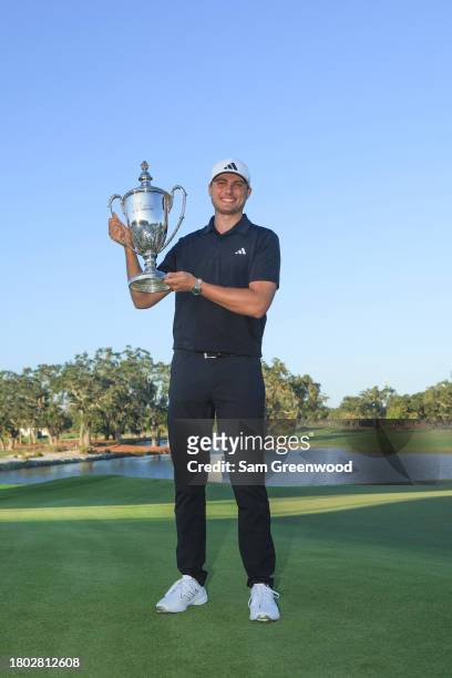 Ludvig Aberg of Sweden poses for a photo with the trophy after winning The RSM Classic on the Seaside Course at Sea Island Resort on November 19,...