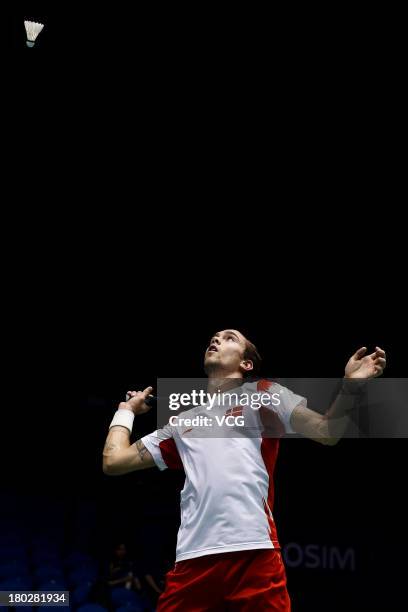 Jan O Jorgensen of Denmark competes in the men's singles match against Tian Houwei of China on day 2 of the 2013 China Badminton Masters at Changzhou...