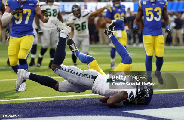 Metcalf of the Seattle Seahawks scores a touchdown during the first quarter in the game against the Los Angeles Rams at SoFi Stadium on November 19,...