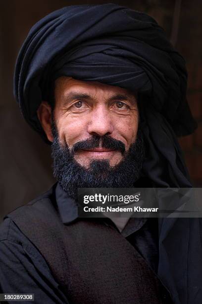 man in black - pashtun stock pictures, royalty-free photos & images