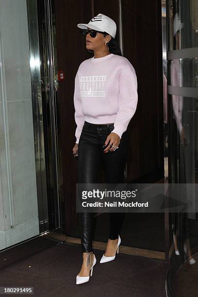 Rihanna seen leaving her hotel on September 11, 2013 in London, England.