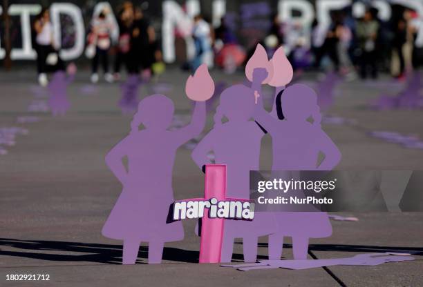 Mothers of missing daughters, victims of feminicide and sexist violence, are demonstrating with silhouettes of wooden women in the Zocalo of Mexico...