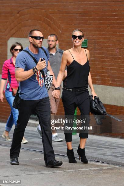 Model Heidi Klum and Martin Kristen are seen in Soho on September 10, 2013 in New York City.