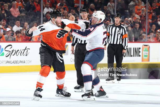 Nicolas Deslauriers of the Philadelphia Flyers and Mathieu Olivier of the Columbus Blue Jackets fight during the first period at the Wells Fargo...