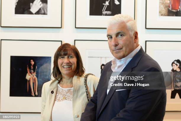 Mitch Winehouse and Janis Winehouse attend the opening of The Amy Winehouse Foundation exhibition to mark her 30th birthday at The Proud Gallery on...