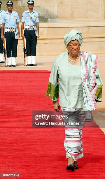 Liberian President Ellen Johnson Sirleaf inspecting the guard of Honour during her ceremonial reception at Rashtrapati Bhawan on September 11, 2013...