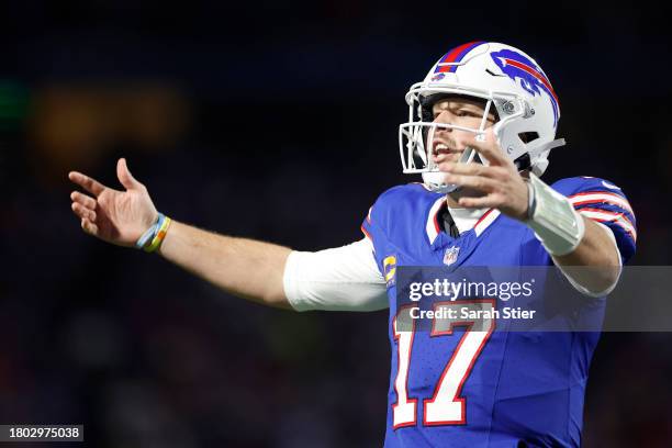 Josh Allen of the Buffalo Bills celebrates after throwing a touchdown pass in the third quarter against the New York Jets at Highmark Stadium on...