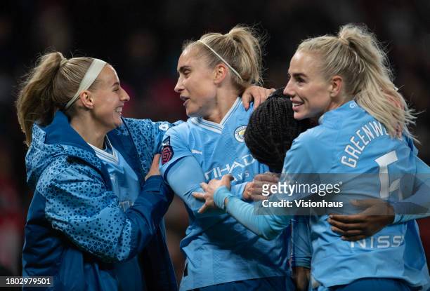 Chloe Kelly, Steph Houghton, Khadija Shaw and Alex Greenwood of Manchester City celebrate at the final whistle during the Barclays Womens Super...