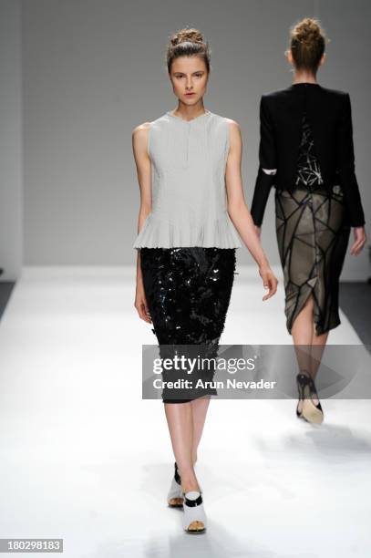 Model walks the runway at Bibhu Mohapatra fashion show during Mercedes-Benz Fashion Week Spring 2014 at The Studio at Lincoln Center on September 11,...