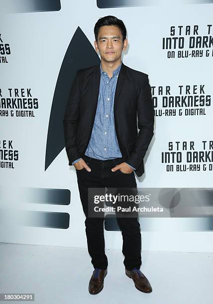 Actor John Cho attends the "Star Trek Into Darkness" Blu-ray/DVD release party at the California Science Center on September 10, 2013 in Los Angeles,...