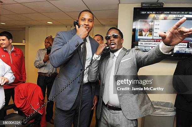 Professional basketball player Carmelo Anthony and rapper P. Diddy attend the annual charity day hosted by Cantor Fitzgerald and BGC at the BGC...