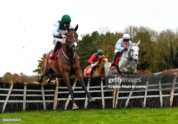 Kildare , Ireland - 26 November 2023; Bob Cigar, with Jack Kennedy up, jumps the last on the way to winning the Fox Valet Retirement Handicap Hurdle...