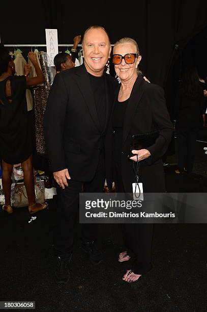 Designer Michael Kors and Joan Kors backstage at the Michael Kors fashion show during Mercedes-Benz Fashion Week Spring 2014 at The Theatre at...