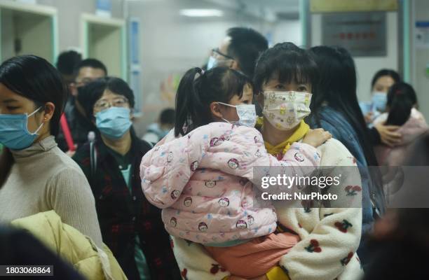 Nurse is preparing an infusion for a child in the infusion area of Hangzhou First People's Hospital in Hangzhou, Zhejiang province, China, on...