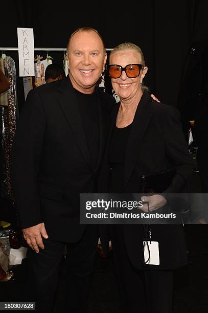 Designer Michael Kors and Joan Kors backstage at the Michael Kors fashion show during Mercedes-Benz Fashion Week Spring 2014 at The Theatre at...