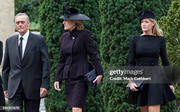 Gerald Grosvenor, Duke Of Westminster and Natalia Grosvenor, Duchess of Westminster with Lady Viola Grosvenor attend a requiem mass for Hugh van...