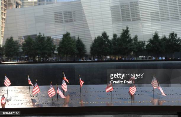 Flags stand in names at the at the 9/11 Memorial during ceremonies for the twelfth anniversary of the terrorist attacks on lower Manhattan at the...