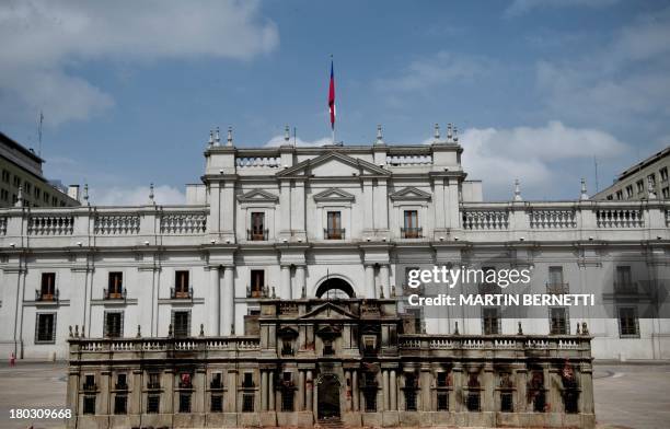 Chilean students placed a scale model of the presidential palace as it looked after the airstrike carried out by the rebellious forces of General...