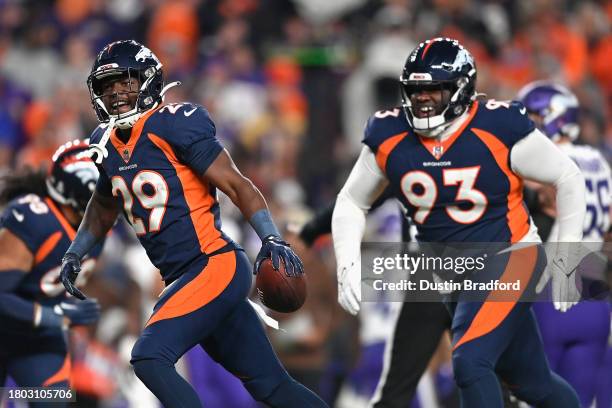 Cornerback Ja'Quan McMillian of the Denver Broncos reacts after a fumble recovery from the Minnesota Vikings during the first quarter of the NFL game...